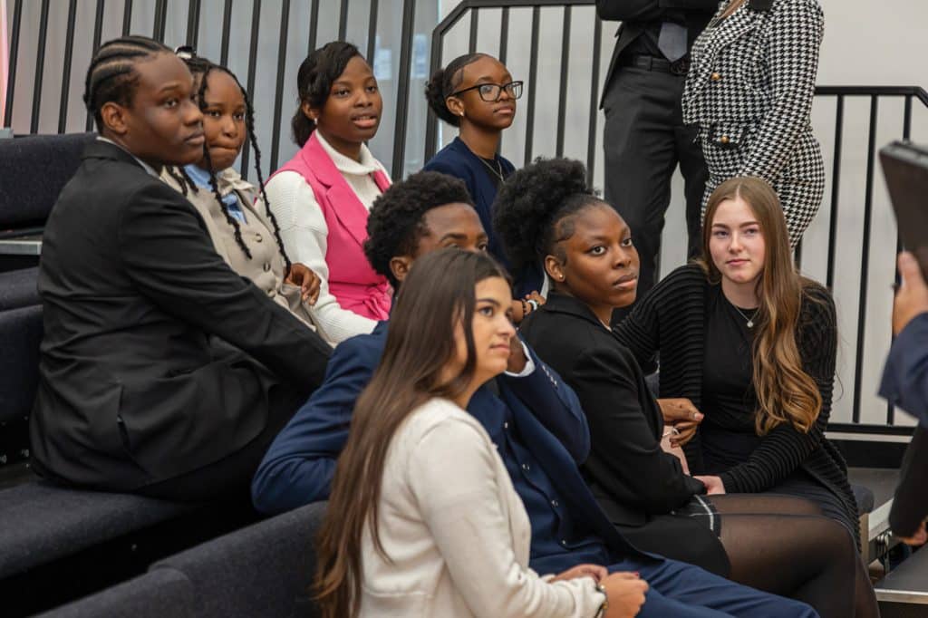 A collection of students attending a seminar on maths.